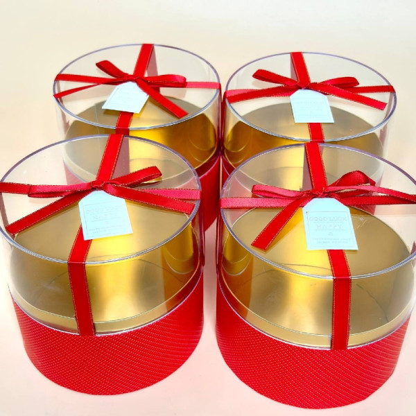 Подарункові коробки круглі з прозорою кришкою та стрічкою червоного кольору