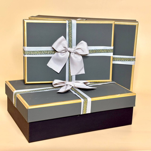 Подарункові коробки з бантом сірого кольору 