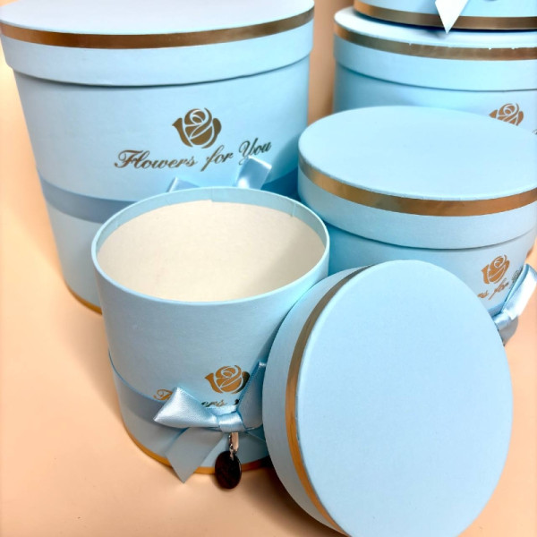 Набір з пяти круглих коробок для квітів блакитного кольору