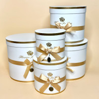 Набір з пяти круглих коробок для квітів білого  кольору