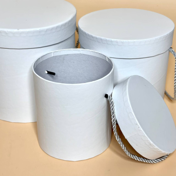 Круглі коробки для подарунків із кришкою та ручкою білого кольору