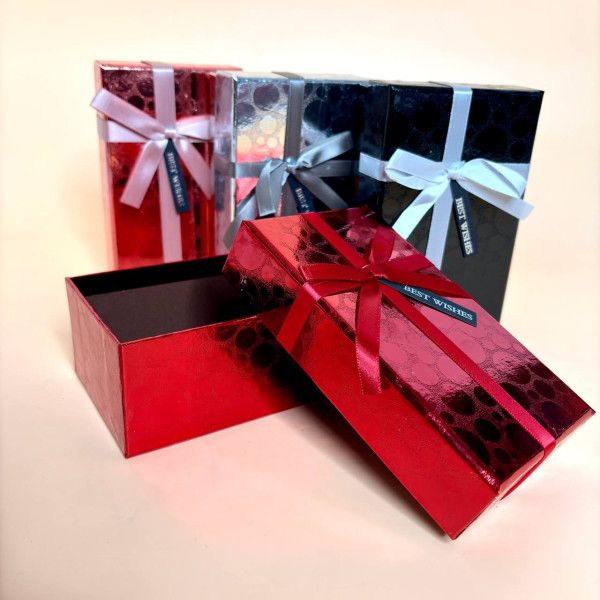 Подарункові коробки прямокутні з бантиком 