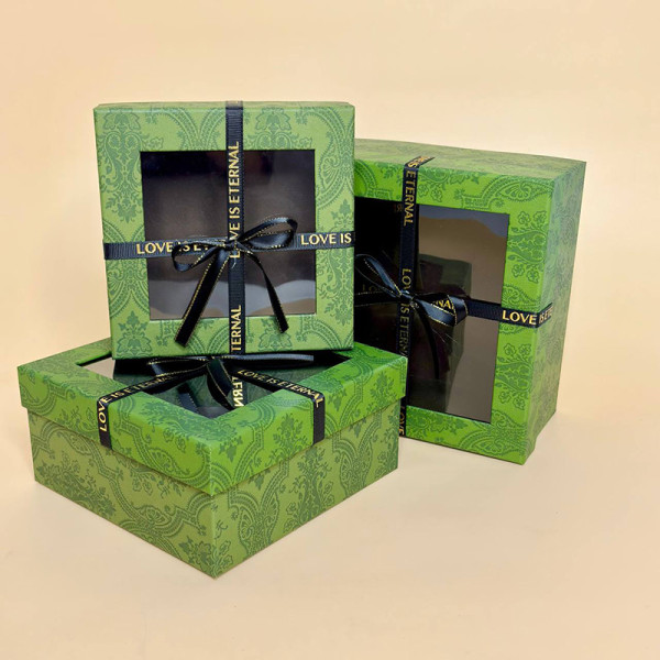 Набір  коробок з декоративними бантами  зеленого кольору