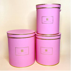 Набір з трьох круглих коробок для квітів рожевого кольору