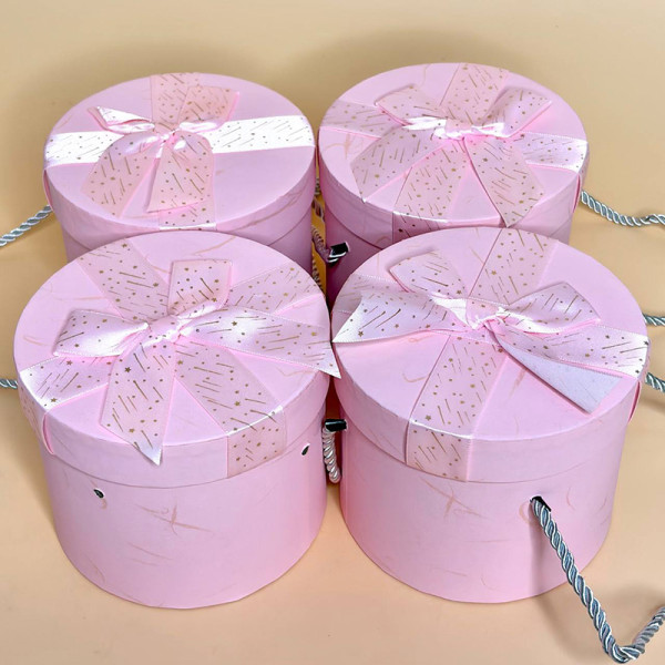 Подарункові коробки циліндричні з кришкою та бантиком рожевого кольору