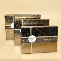 Подарункові коробки з рельєфним тисненням бронзового кольору