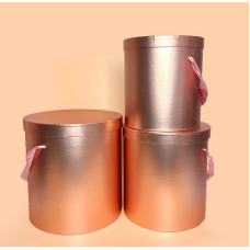 Набір круглих подарункових коробок з кришкою та ручками зі стрічки колір рожеве золото