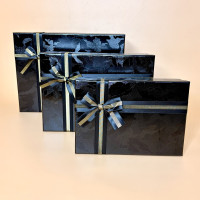 Набір прямокутних подарункових коробок з бантом чорного кольору