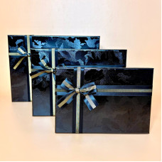 Набір прямокутних подарункових коробок з бантом чорного кольору