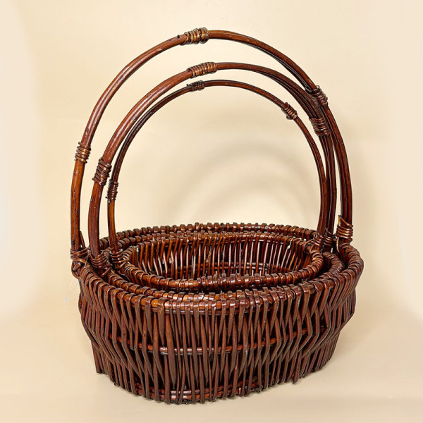 Набір плетених кошиків з ручками коричневого кольору 