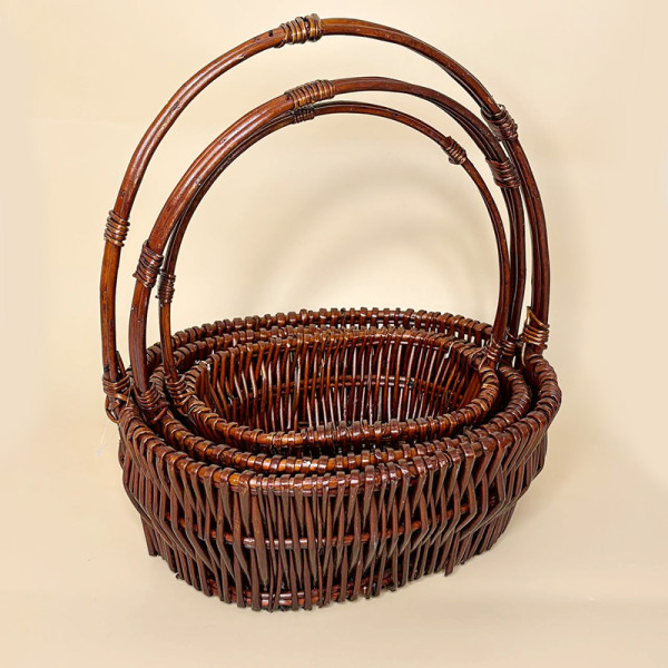 Набір плетених кошиків з ручками коричневого кольору 