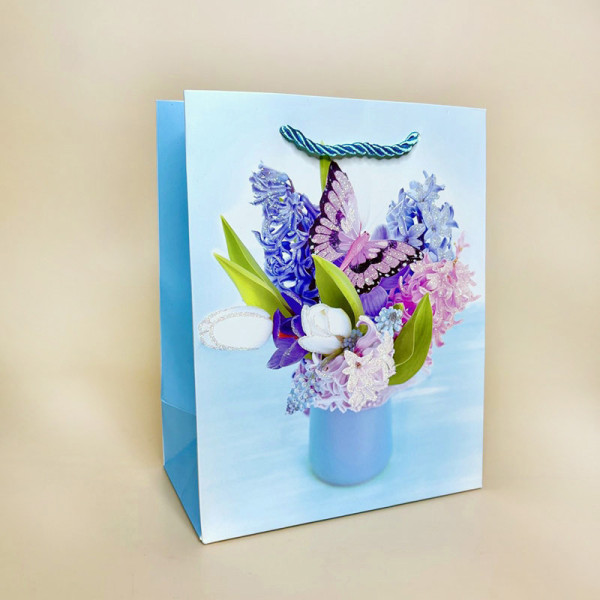 Подарунковий пакет з квітами у пастельних тонах "Квітка" 