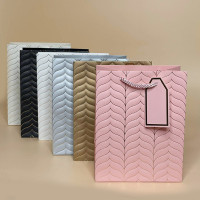  Пакети для подарунків з біркою  розмір S