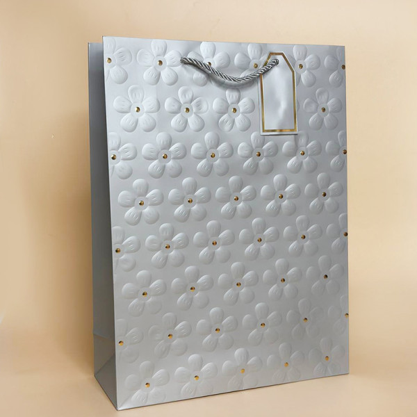 Подарункові пакети з тисненням Квітка розмір S