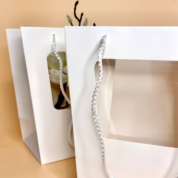 Пакети з прозорим екраном білого кольору