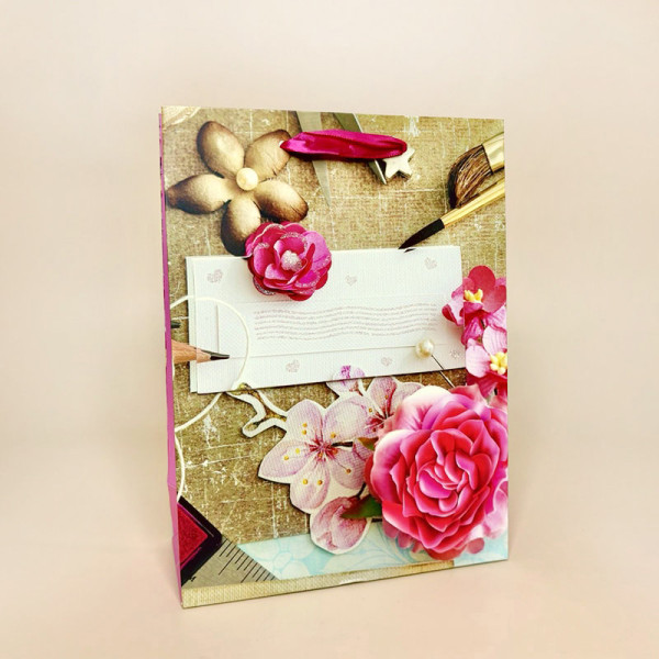 Подарунковий пакет із квітковим дизайном та декоративними елементам"Квіти" 