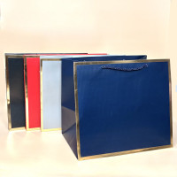 Пакети подарункові з золотистою рамкою серія "Куб" розмір L