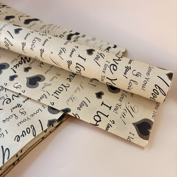 Папір крафтовий з написами “I Love You” та чорними сердечками (у листах)