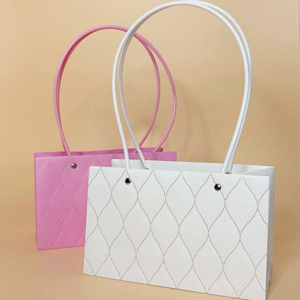 Сумочка для квітів подарункова з ручками рожевого кольору